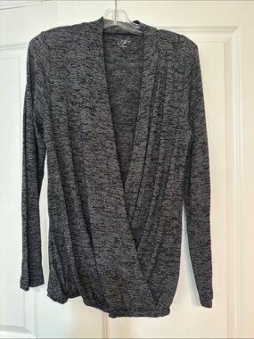 Loft size Medium gray and black striped Loft crossover top with long sleeves.